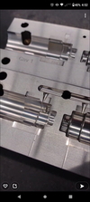  – Thermoset over-mold cavities milled complete. <em>hyper</em>MILL<sup>&reg;</sup> really generates a beautiful surface finish with little effort. The lead-in and lead-outs (hyperMILL calls them macros) on the toolpaths are extremely smooth. I also utilized the “smooth overlap” function so there is no noticeable line when switching between Z level and contouring cuts.