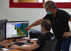 hypermill | intech medical – Sébastien Lacolombe, CAM programmer (left) and William Pigeon, CAM programming manager (right) discuss the machining sequence.